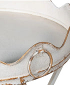 Close-up of a decorative white vase with brown accents on a white background