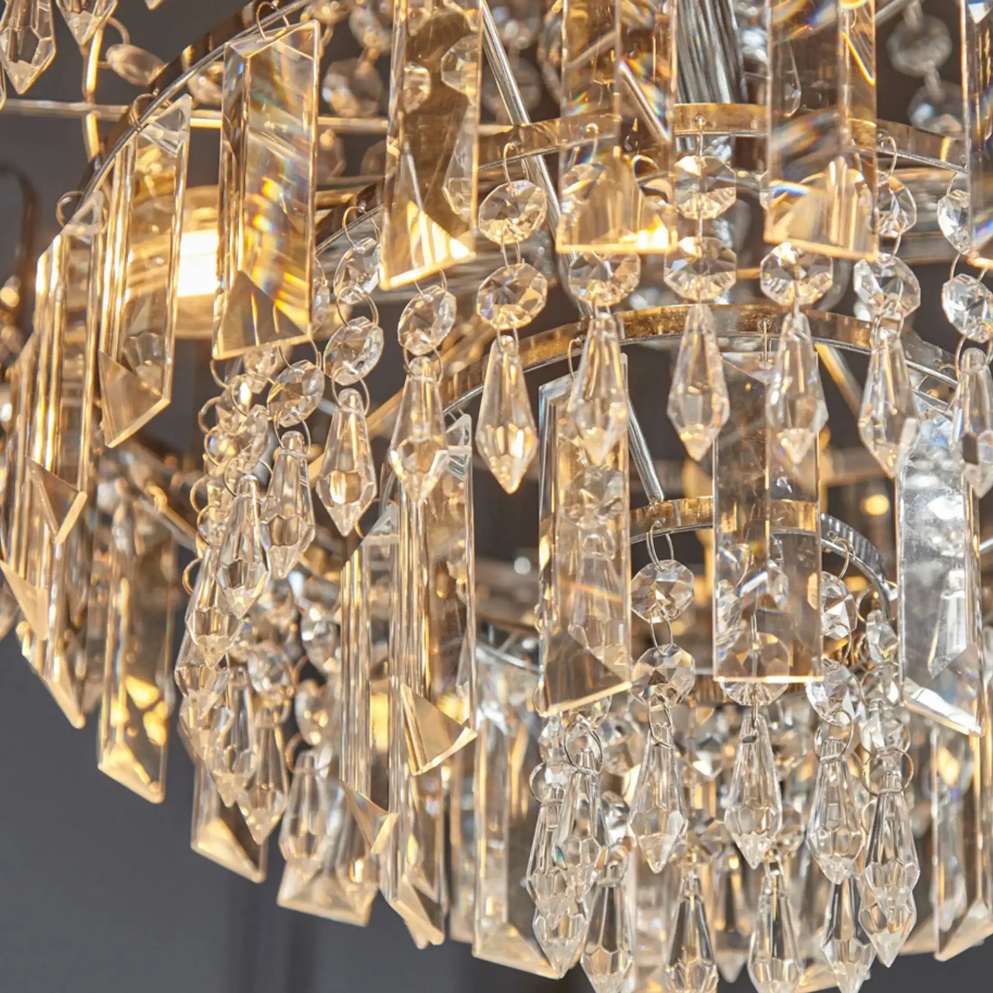 Close-up of a chandelier with crystal details on a dark background