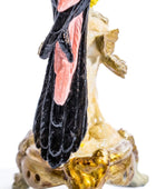 Decorative figurine of a bird on a white background