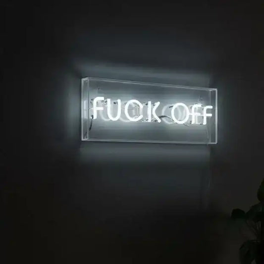 Neon sign with the word 'FUCK OFF' on a black background