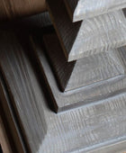 Close-up of wooden steps with a textured finish