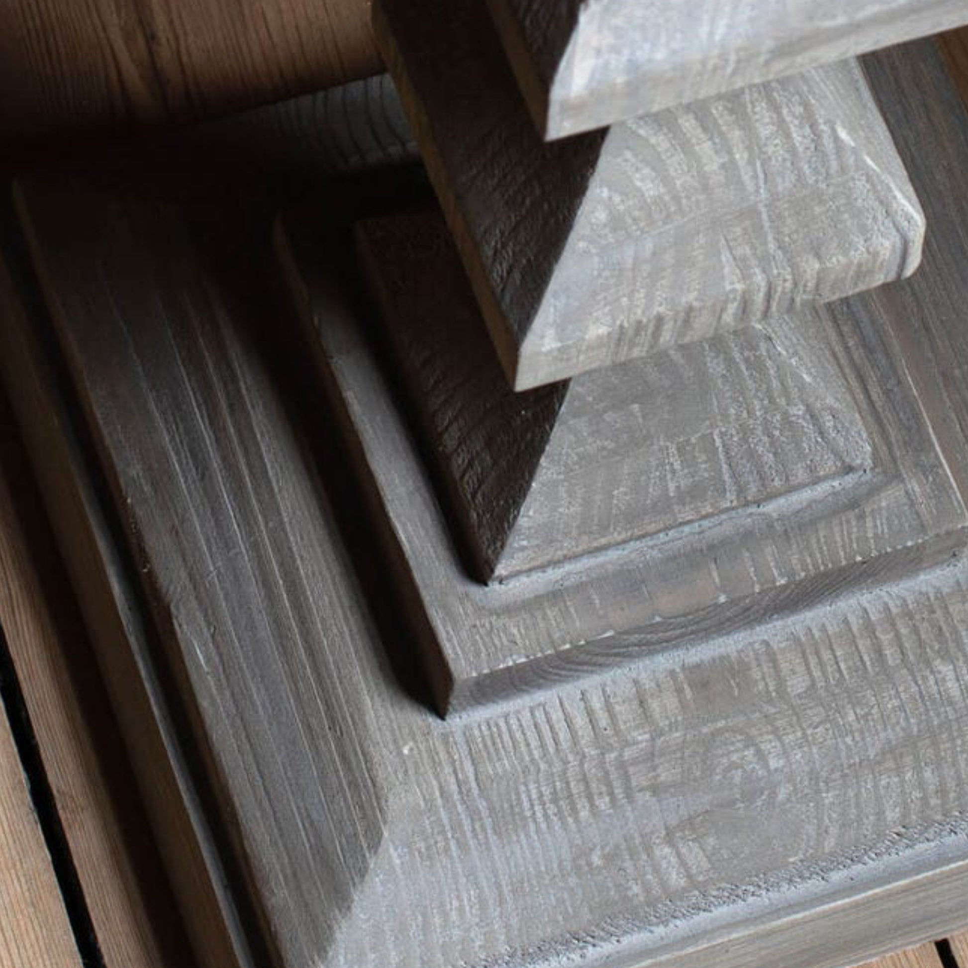Close-up of wooden steps with a textured finish