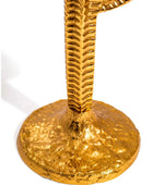 Gold candle holder with textured design on a white background