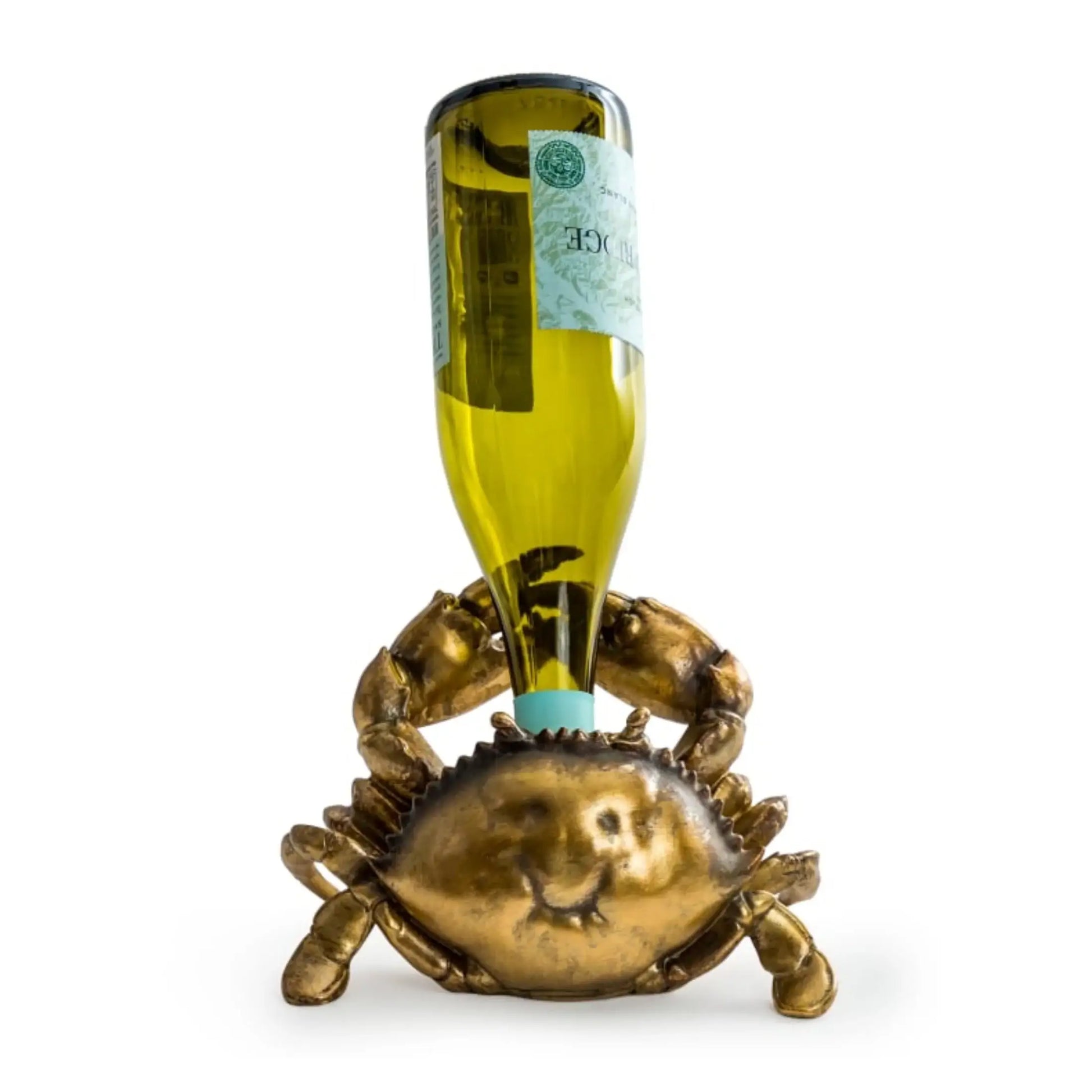 Gold crab-shaped bottle holder with a wine bottle on a white background