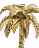 Gold palm tree candle holder on a white background
