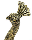 Bronze rooster figurine on a white background