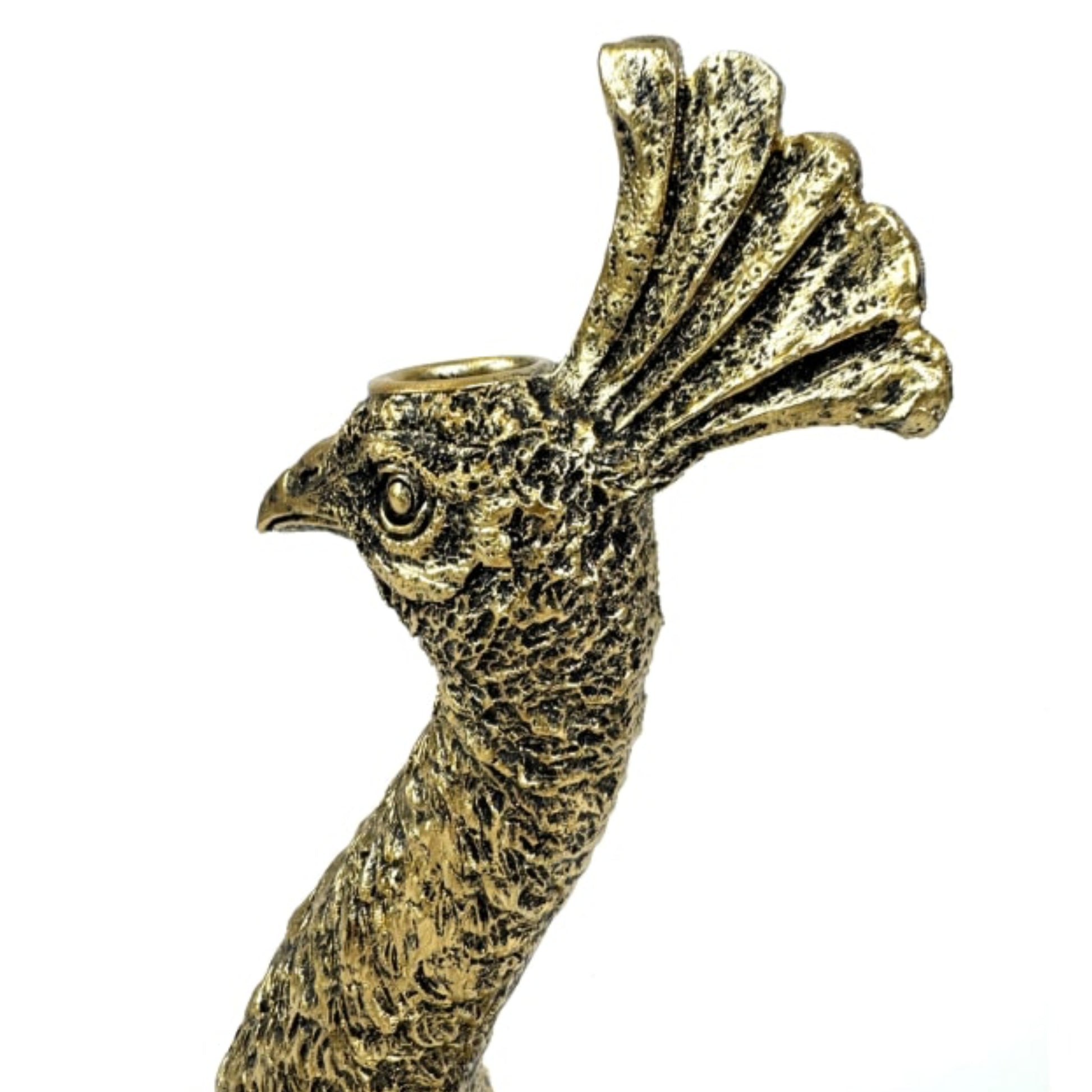 Bronze rooster figurine on a white background