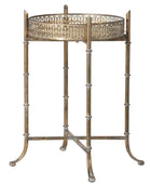 Decorative metal side table with a round top on a white background