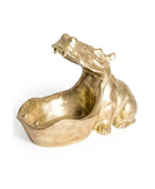 Gold-colored sculpture of a stylized animal on a white background