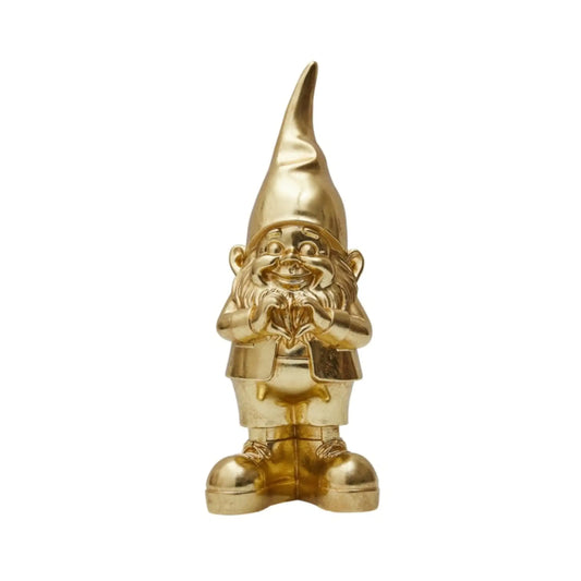 Gold gnome figurine on a white background
