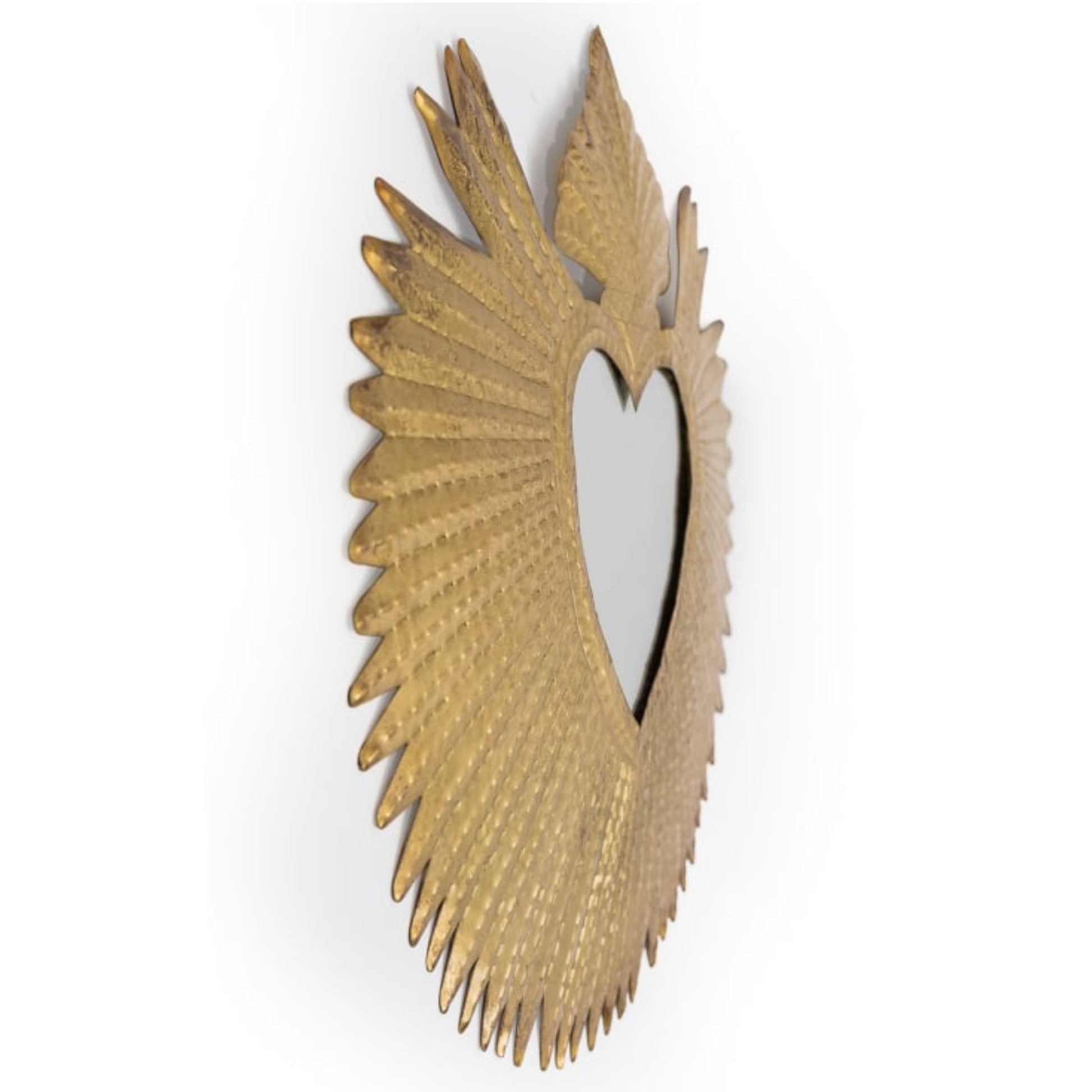 Decorative wall mirror with gold wing-like design on a white background