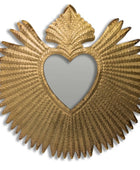 Decorative wall mirror with gold leaf design and heart center on a white background
