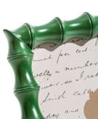 Green bamboo-style frame with a decorative background