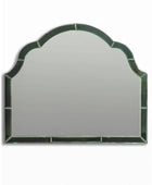 Decorative mirror with a green frame on a white background