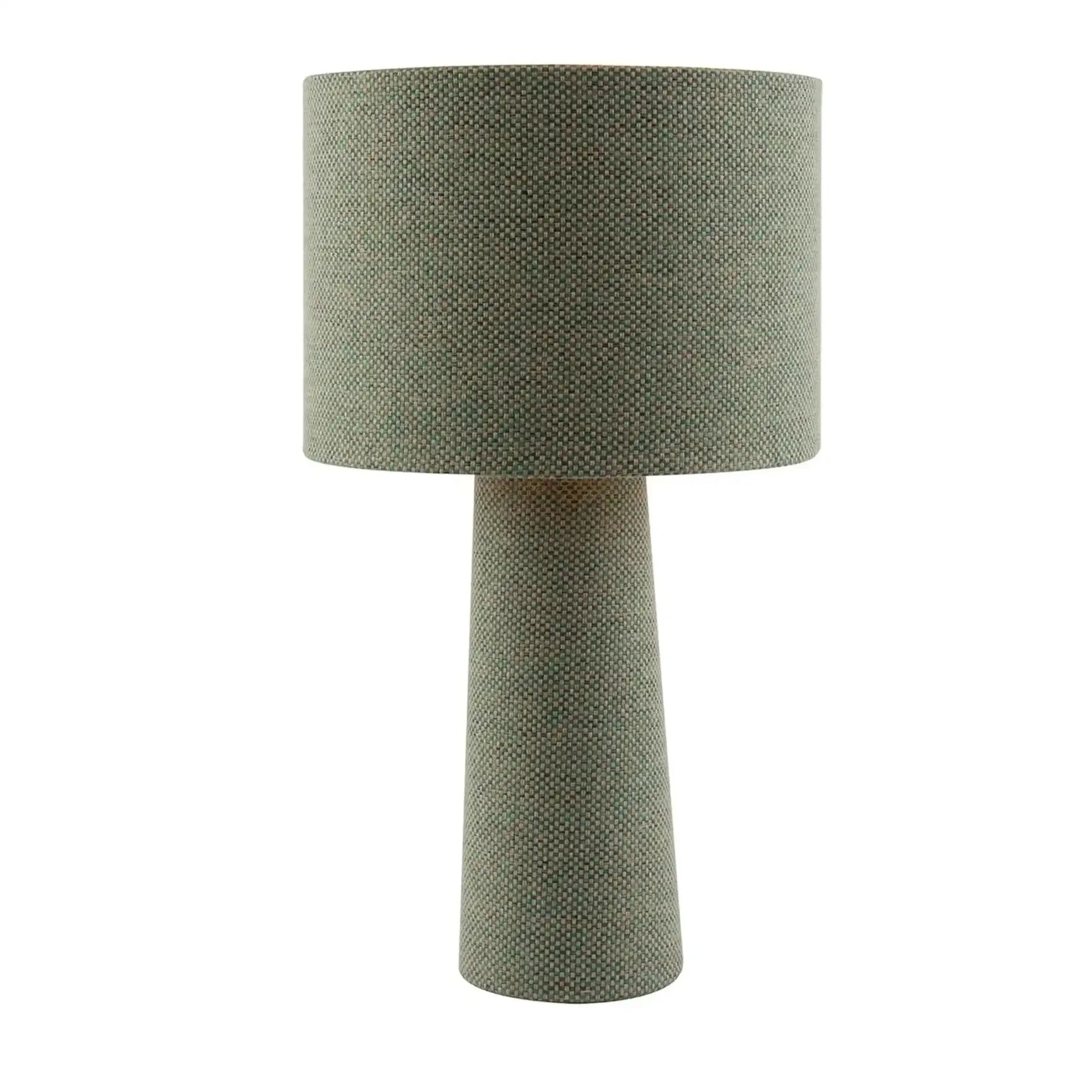 Green textured table lamp on a white background