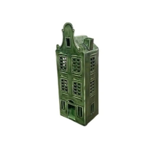Green ceramic model of a two-story building on a white background