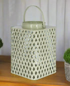 Decorative lantern with lattice design on a white background