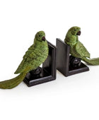 Green parrot bookends on a white background