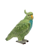 Green parrot figurine on a white background