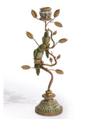 Decorative candle holder with parrot design on a white background