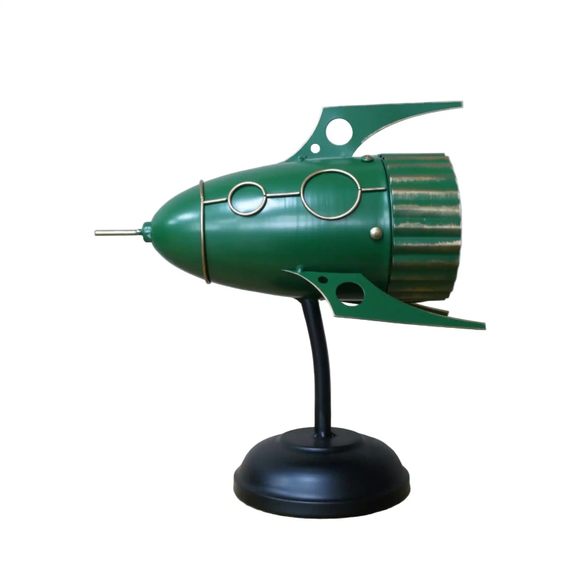Green rocket ship model on a stand against a white background