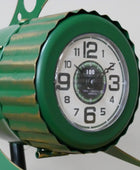 Green clock with a white face on a plain background