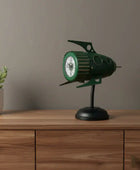 Green vintage-style clock on a white background