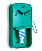 Green wall clock with fish design on a white background