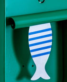 Green mailbox with a fish-shaped mail slot cover featuring blue and white stripes.