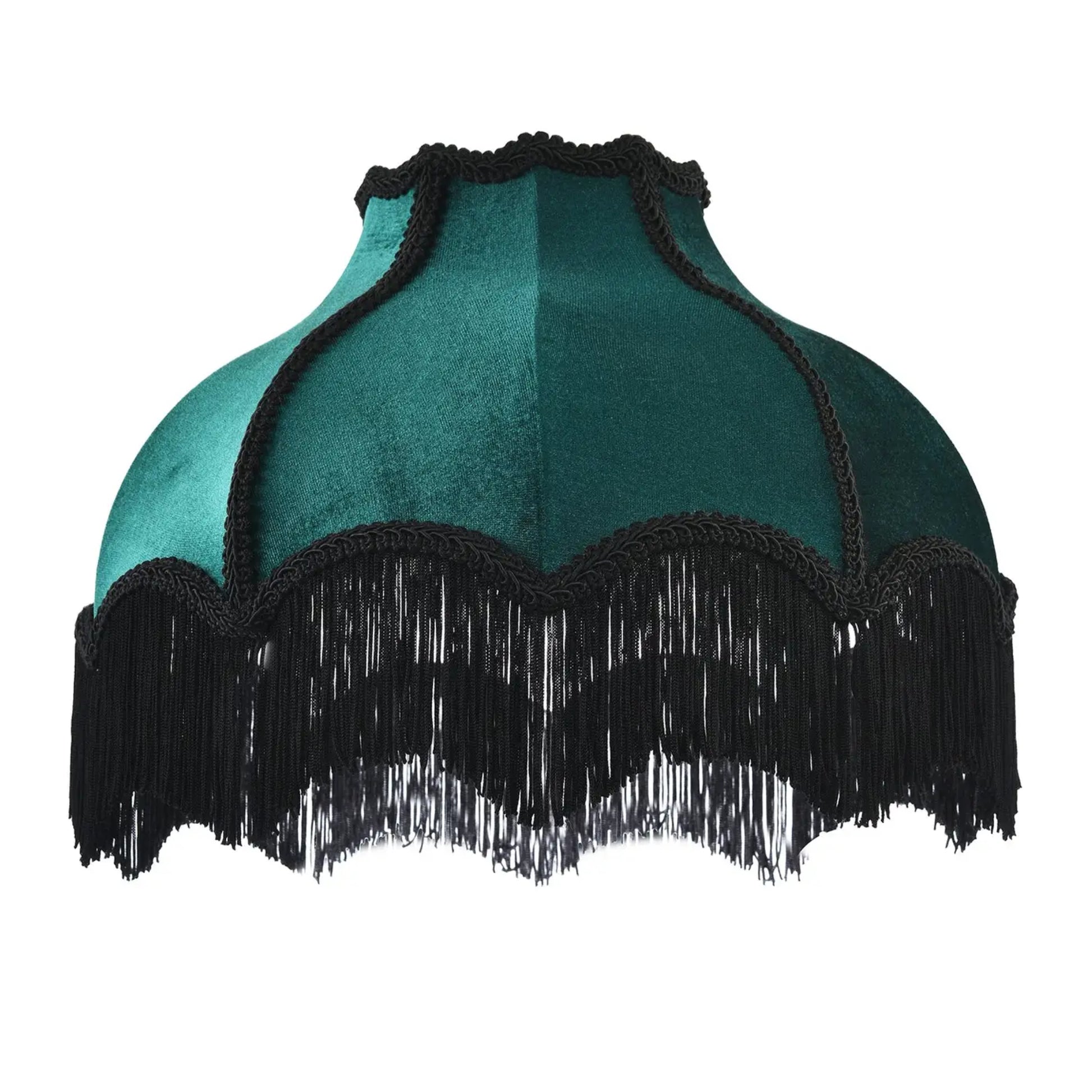 A vintage-style teal velvet lampshade with black fringe trim along the scalloped edge.