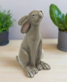 Gray ceramic rabbit figurine on a white background