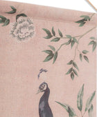 Decorative fabric with peacock and leaf design on a beige background