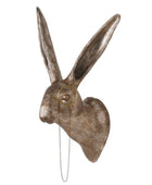Decorative rabbit head wall mount on a white background