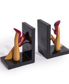 Bookends with high-heeled shoe design on a white background