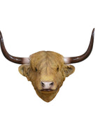 A realistic longhorn bull head wall mount with curved dark brown horns, mounted against a faux gray brick wall background.
