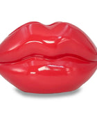Red lip-shaped container on a white background