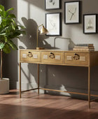 Wooden console table with decorative items in a room with a large window and wall art.
