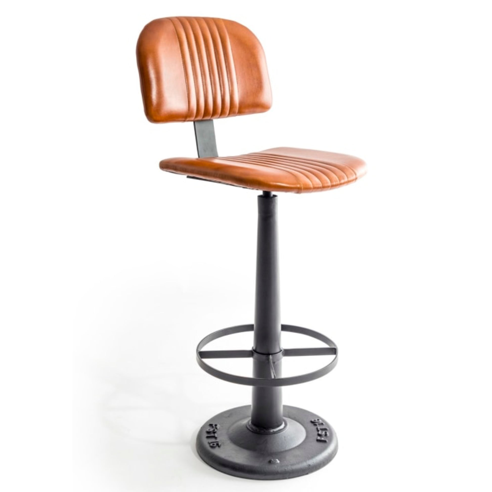 A modern industrial-style bar stool with a curved, ribbed cognac brown faux-leather seat and backrest, supported by a black metal swivel base with a footrest ring, on a white background.