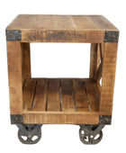 Wooden side table with metal accents and wheels on a plain background