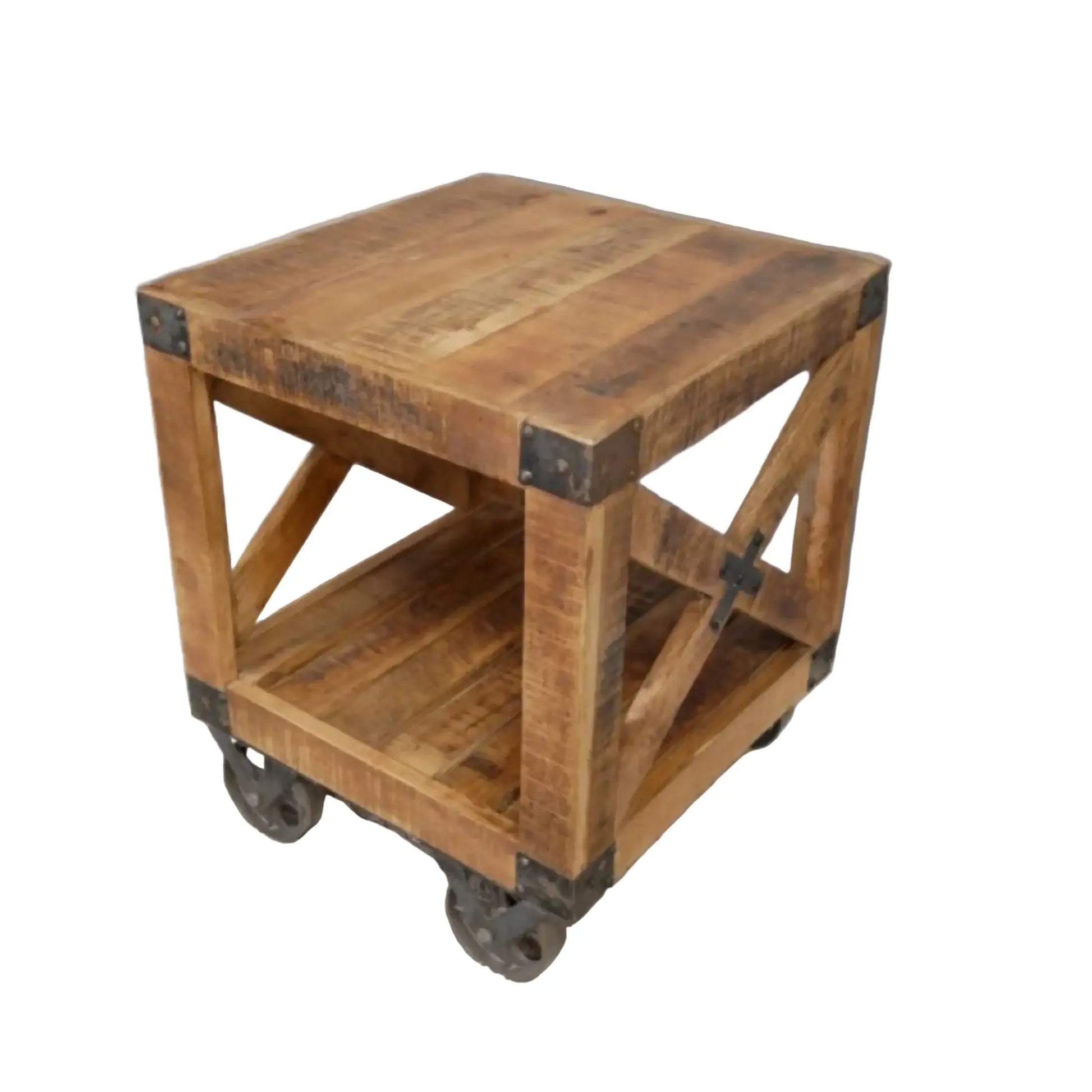 Wooden side table with metal accents on a carpeted floor against a gray wall.