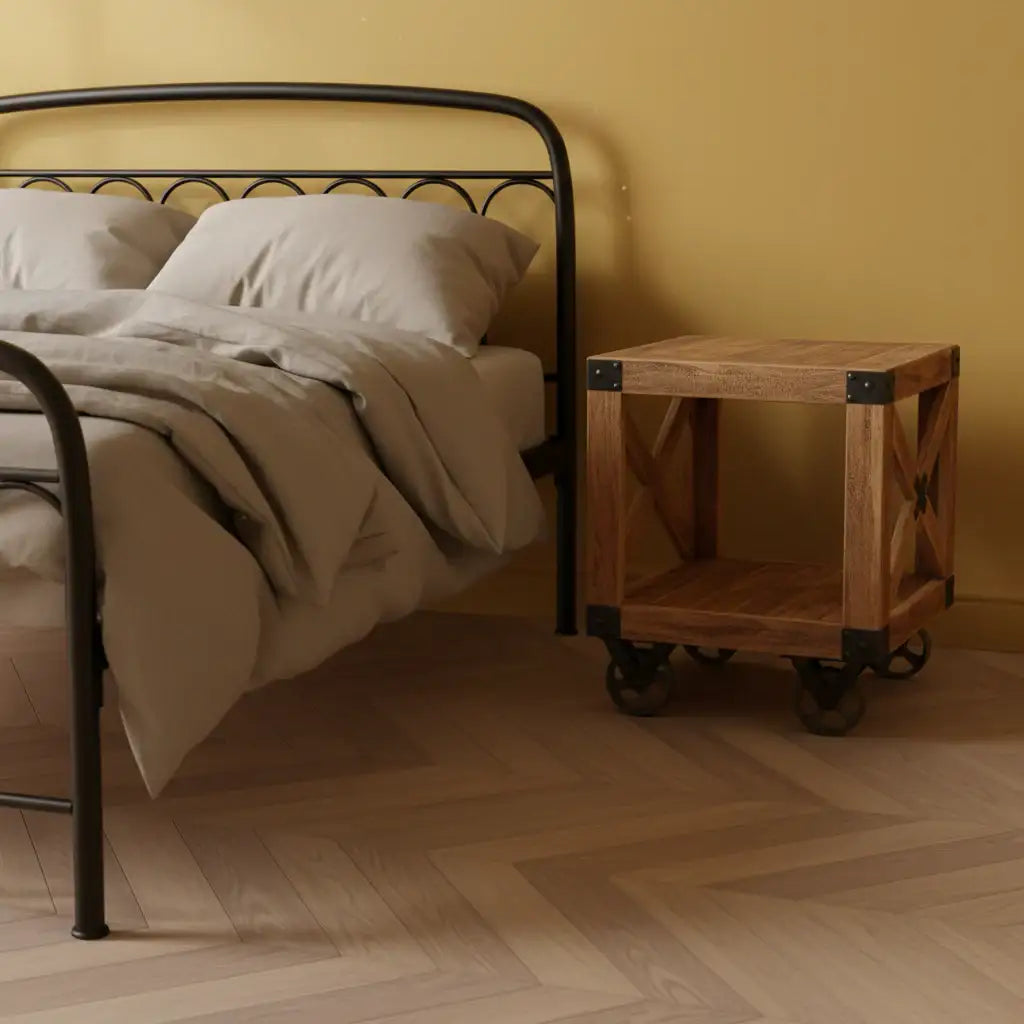 Bedroom with a metal bed frame, wooden nightstand, and beige walls.