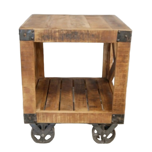 Wooden side table with metal accents and wheels on a plain background