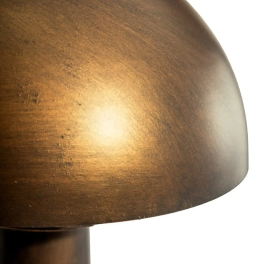 Close-up of a bronze lampshade on a white background