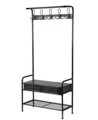 Black metal coat rack with shelves and hooks on a white background