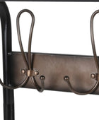 Metal coat rack with hooks on a white background