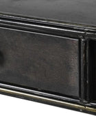 Close-up of a black metal drawer with a white background