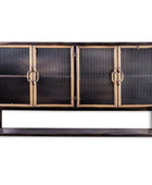 A modern wall-mounted sideboard cabinet with four doors featuring vertical fluted glass panels in a dark finish, framed by brass-toned metal borders and handles, set against a plain white background.