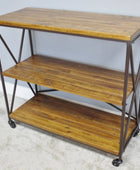 Wooden shelf with metal frame and wheels against a light gray wall.