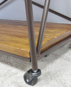 Wooden shelf with metal frame and wheels on a carpeted floor