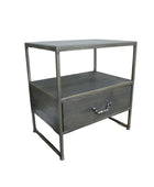 Metal nightstand with a drawer on a wooden floor against a gray wall